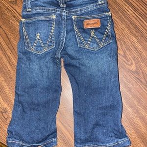 6-9months girl Wrangler jeans worn couple time.